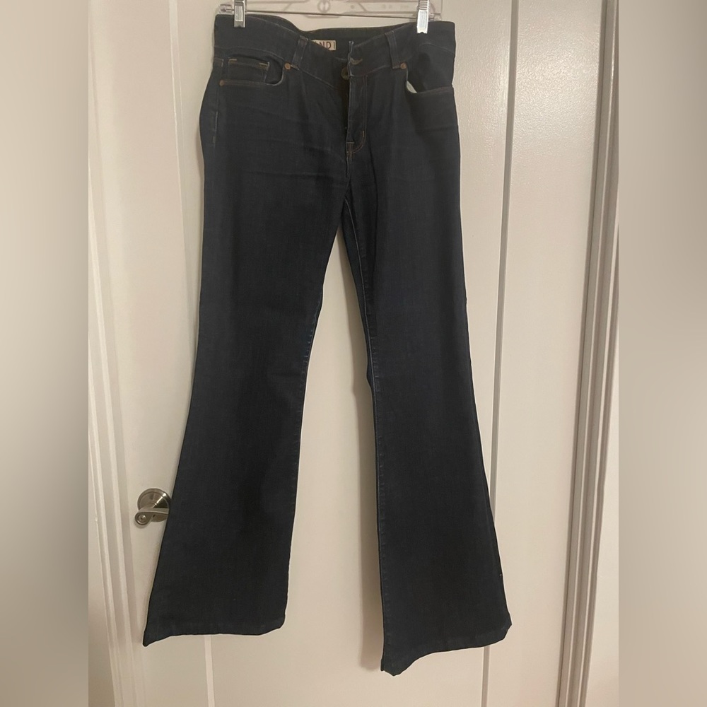 J Brand  love story bell bottom in size 31; color is “pure”